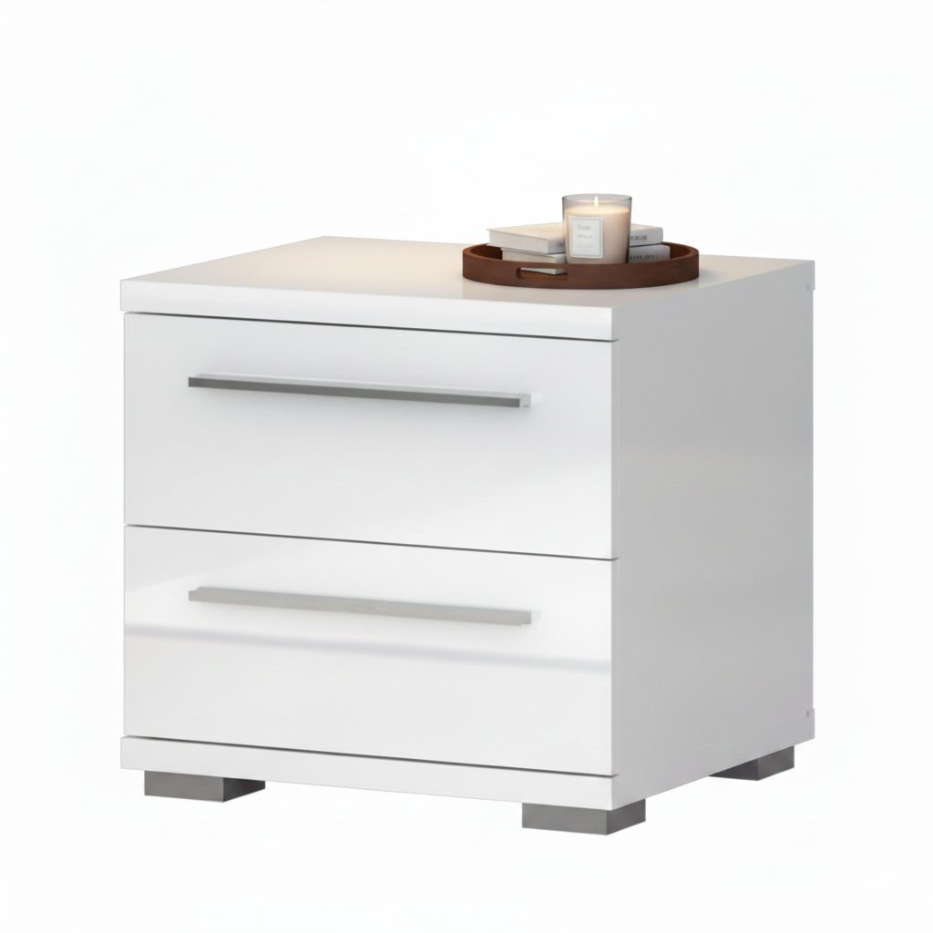 White modern two-drawer nightstand with silver handles, topped with a wooden tray holding a lit candle and stacked books.